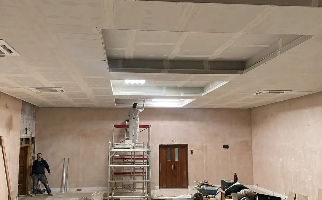 Ames taping and ceiling preparation in progress on a commercial job, Newington, Edinburgh