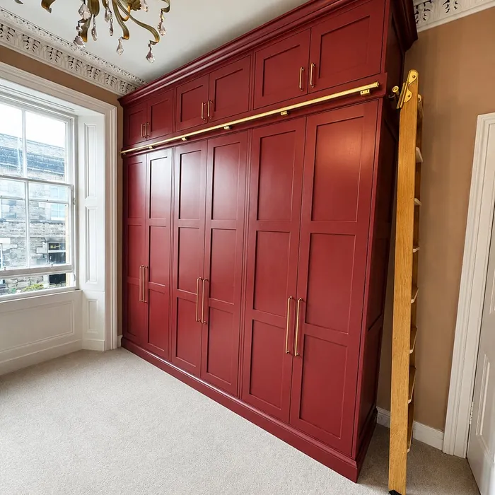 Hand-painted, fitted wardrobe in burgundy with brass handles, Edinburgh